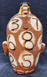 White 7 Eyes Rainbow Face Jug