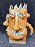 Four King Faces Face Sculpture