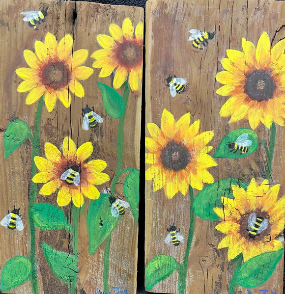 A Pair of Sunflowers and Bees