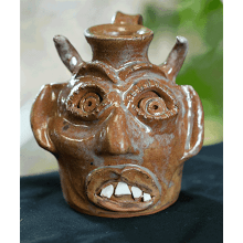 “Brown Devil Face” Jug (8 - 11)