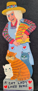 "A Cat Lady with Two Pockets"